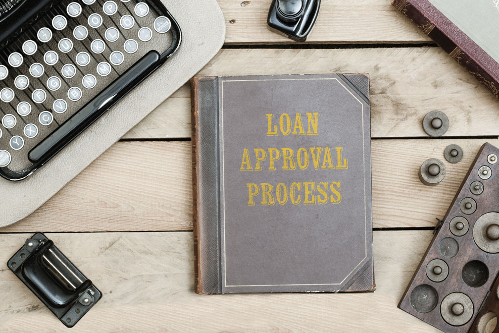 An old book about loan approval success representing the need for personal loan apply